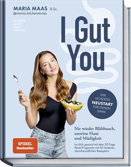 Buchcover mit Titel „I Gut You“, Maria Maas hält Papaya mit Früchten, hellgrüner Hintergrund mit Schrift.